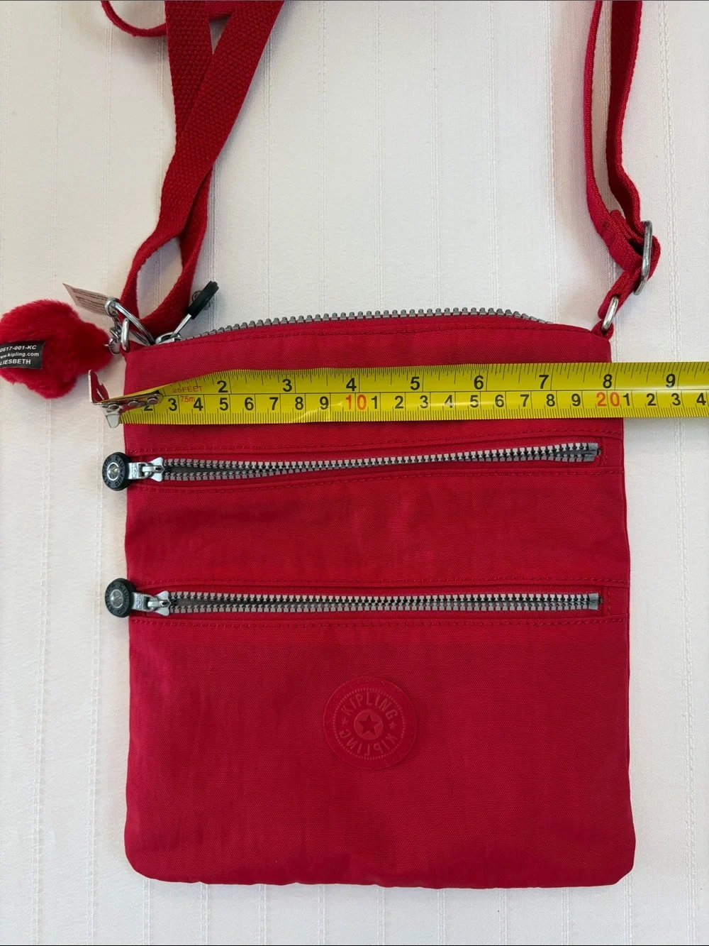 Kipling Red Crossbody with Playful Pom Charm